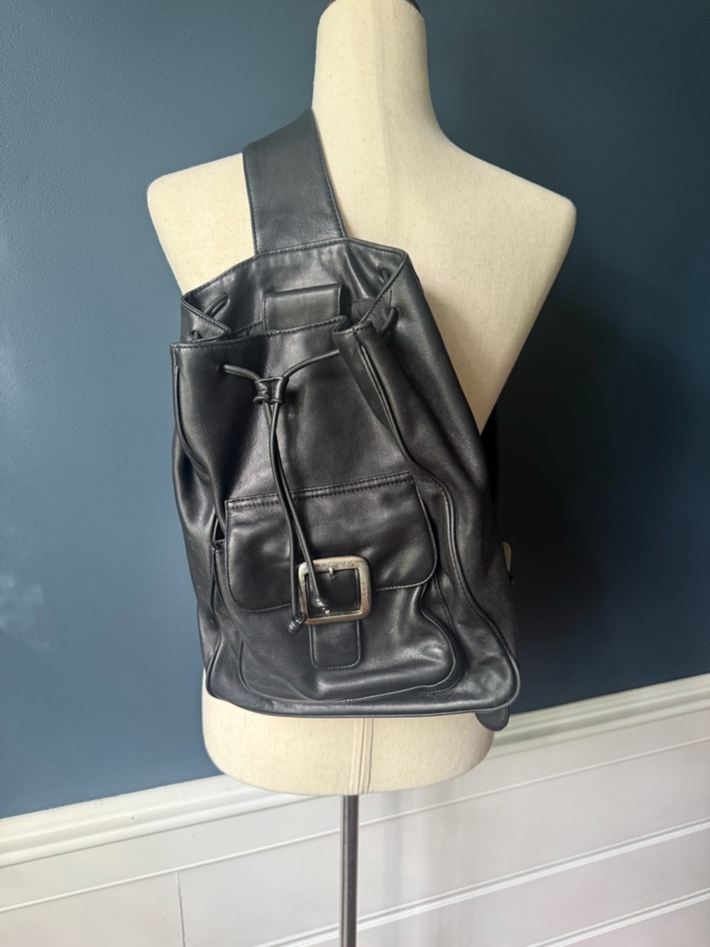 Wilsons Leather Black Leather Drawstring Sling Backpack with Buckle Pocket